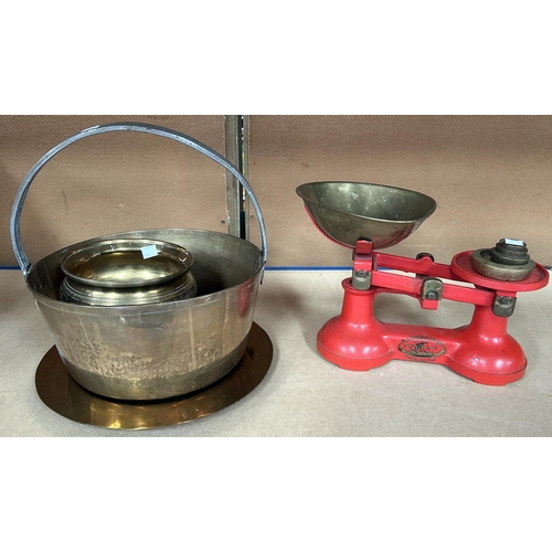 91 - A set of brass kitchen scales and weights; a jam pan and metal ware.