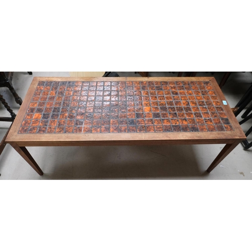 928 - A mid 20th Century large teak tile top Danish designer coffee table with rust-coloured squares, 137x... 