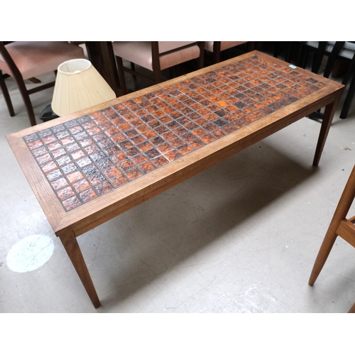 928 - A mid 20th Century large teak tile top Danish designer coffee table with rust-coloured squares, 137x... 