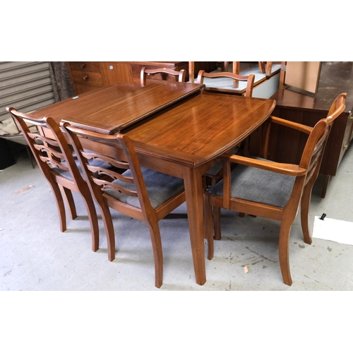 932 - A Bartlett High Wycombe Strongbow extending dining table and chairs.