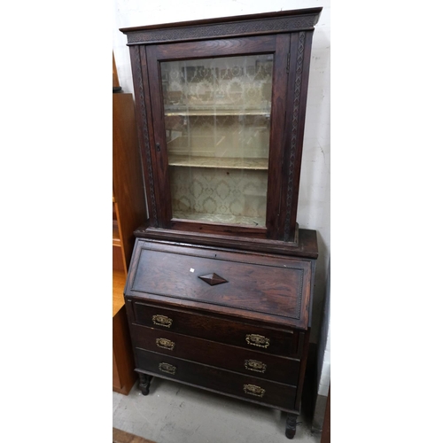 972 - A matched full height oak bureau bookcase with glazed door above fall front and drawers below.