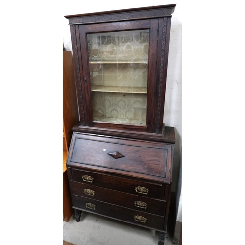 972 - A matched full height oak bureau bookcase with glazed door above fall front and drawers below.