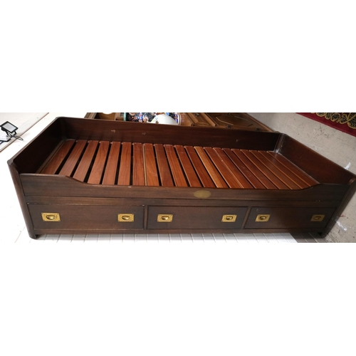 973 - A mahogany reproduction campaign bed with drawers with inset brass handles below.