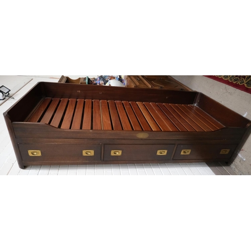 973 - A mahogany reproduction campaign bed with drawers with inset brass handles below.