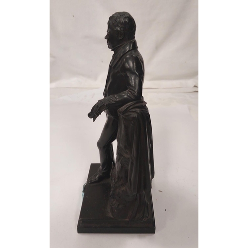 104 - A late 19th Century patinated iron figure of Sir Walter Scott, rectangular plinth base, 24cm.