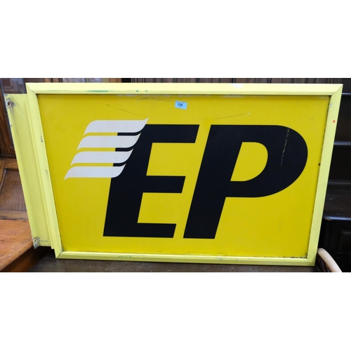 128 - A large yellow wall hanging petrol sign 