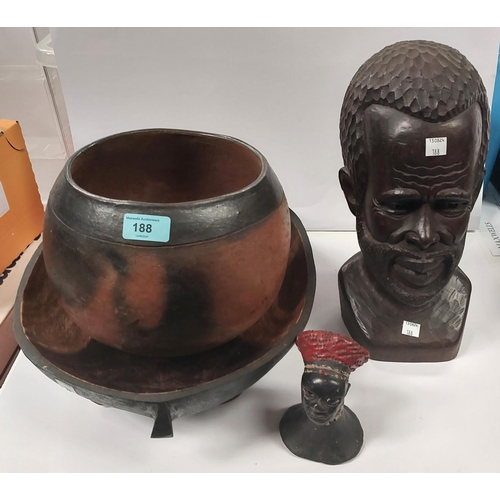 188 - A 20th century carved African bust of a bearded man, a carved African table bowl on four legs and a ... 