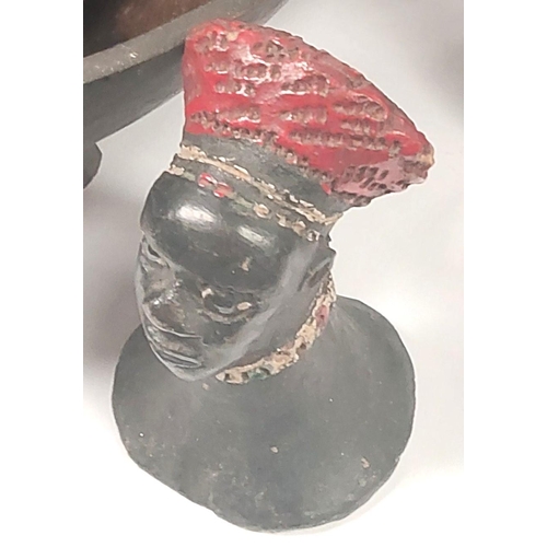 188 - A 20th century carved African bust of a bearded man, a carved African table bowl on four legs and a ... 