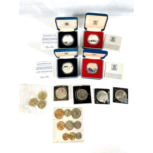 234 - Four silver proof crowns, cased; a 1953 GB coin set, etc.