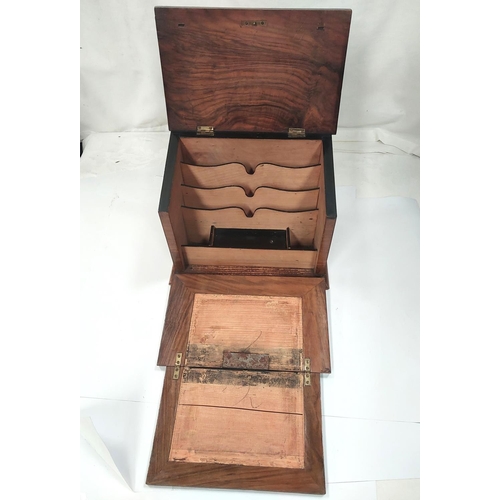 25 - A 19th century walnut correspondence box with slope top, fall front writing surface with internal le... 