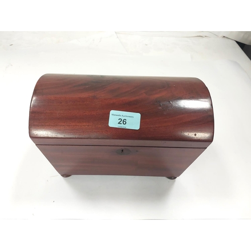 26 - A Georgian mahogany dome top tea caddy on bun feet with two interior compartments.