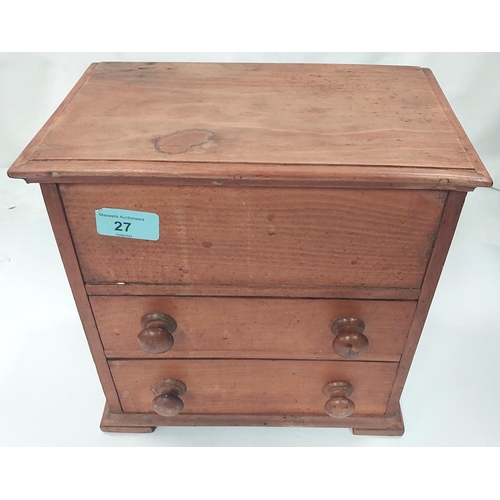 27 - A mahogany apprentice chest, two height, width 27cm; a cast iron oil lamp with brass reservoir.