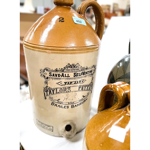 402 - A large vintage stone ware Save-all Taylors Taylors patent jug, another smaller Rowbottom Hyde, a Ri... 