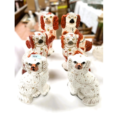 404 - Three pairs of 19th century Staffordshire Spaniels varying sizes