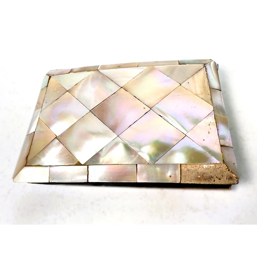 41 - A Victorian mother of pearl card case, 14cm and a similar with engraved decoration. 