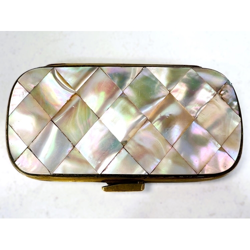 41 - A Victorian mother of pearl card case, 14cm and a similar with engraved decoration. 