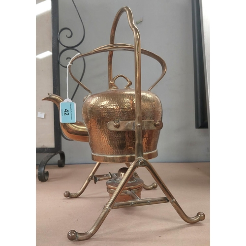 42 - BRASS KETTLE AND STAND - German Arts and Crafts, stamped GBN, 35cm high.