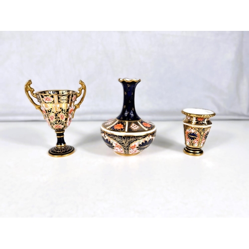 434 - Three miniature Royal Crown Derby vases.