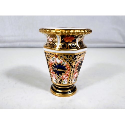 434 - Three miniature Royal Crown Derby vases.