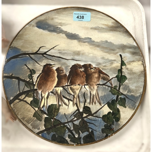 438 - A 19th Century pottery plate decorated with birds signed on verso 