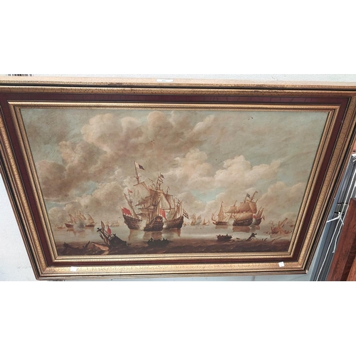 46 - A print of Ships framed in gilt and a street scene framed