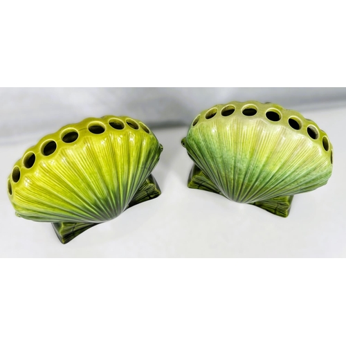 537 - Ault Art Pottery: A near matching pair of scallop shell shaped vases with shaded green glaze each wi... 