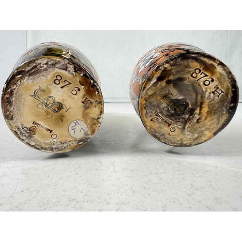 555 - Linthorpe Art Pottery: - A pair of ovoid vases, hand painted with bramble flowers and branches again... 