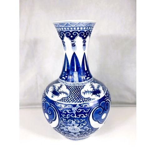 578 - A Chinese blue and white vase with bulbous body and a tapering and flaring neck, dragons and other d... 