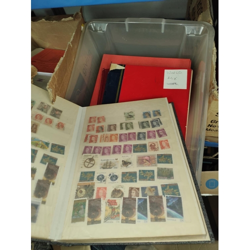 347 - Box of world stamps.