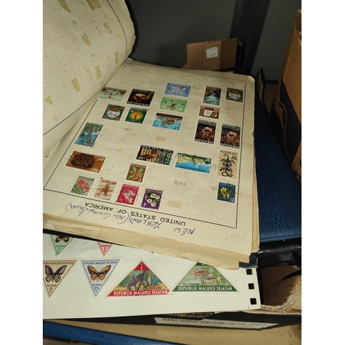 349A - Box of world stamps.