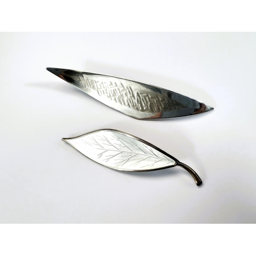 602 - A Norwegian white enamel and silver leaf brooch stamped 