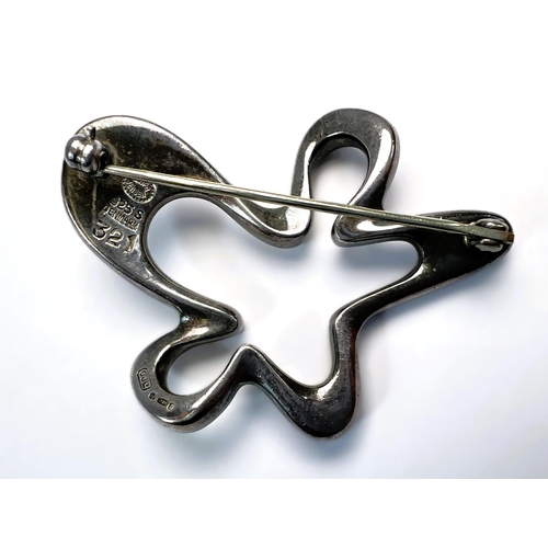 603 - A George Jensen brooch of looped form, stamped 