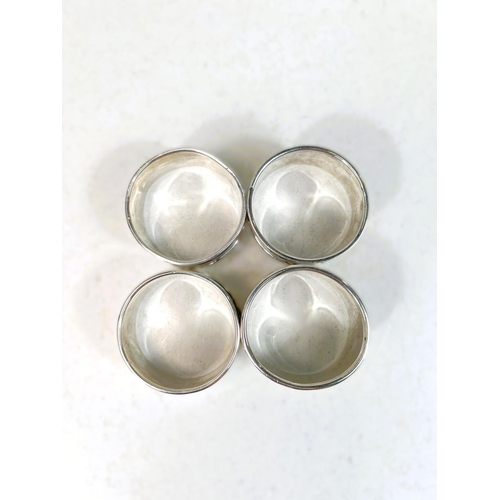 610 - A set of 4 silver napkin rings. Birmingham,1931, 34gms.