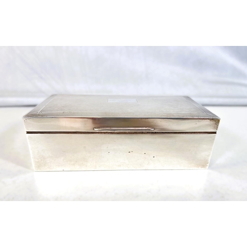 618 - A silver cased cigarette box, engine turned decoration, 17cm, Birmingham, 1962 