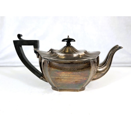 639 - A shaped oval, ribbed, hallmarked silver teapot, inscribed: Birmingham 1926.  22oz (686gms)