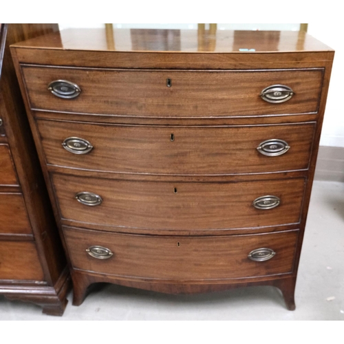 858 - A Georgian small mahogany inlaid bow front chest of four drawers.