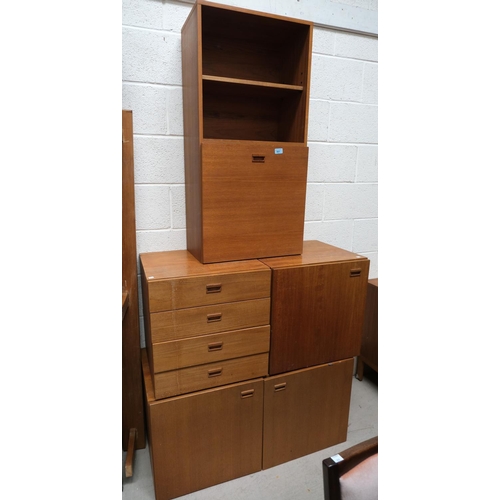 861 - A mid 20th Century teak side unit/wall unit with cocktail fall front section, and various cupboard a... 