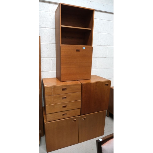 861 - A mid 20th Century teak side unit/wall unit with cocktail fall front section, and various cupboard a... 