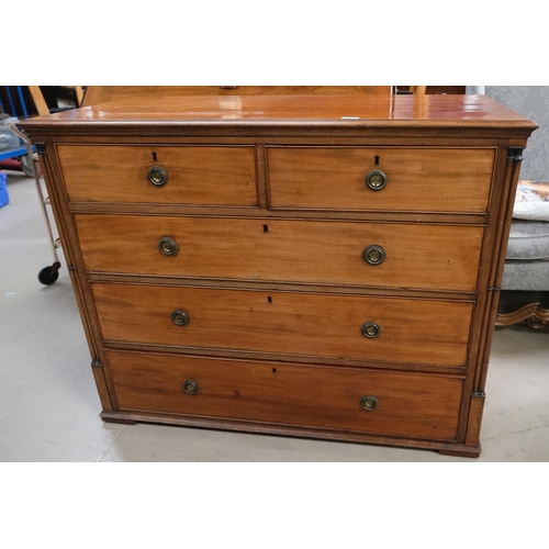 869 - A 19th Century mahogany chest of three long and two short drawers with cluster column supports.