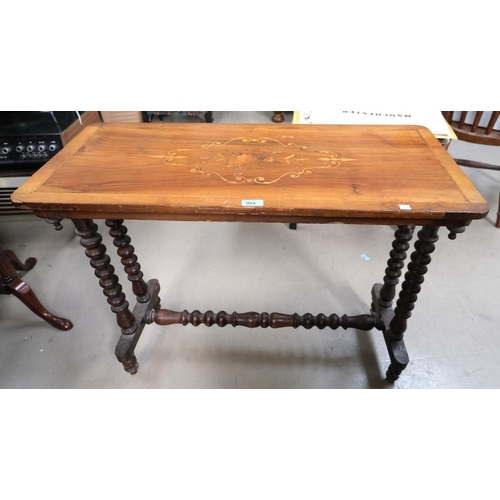 954 - A Victorian walnut stretcher table with floral inlay and bobbin turned legs.