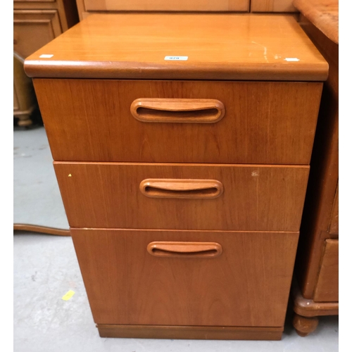 979 - A teak bedside chest of three drawers