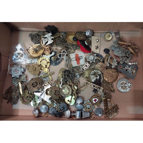 262 - A collection of various military badges and buttons etc