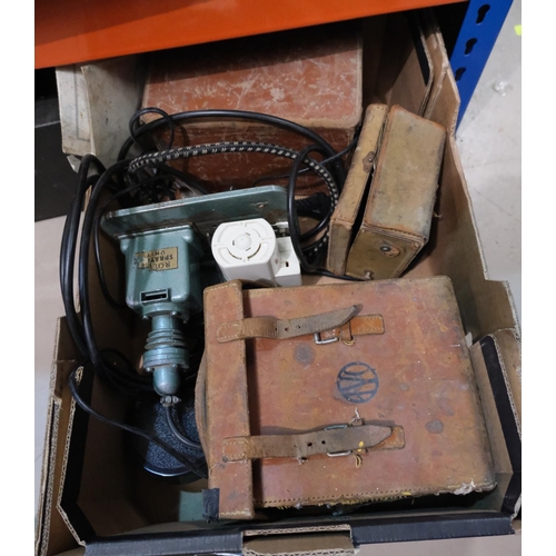 56 - Two vintage cased voltmeters and an ohmmeter; a compressorNo bids sold with next lot