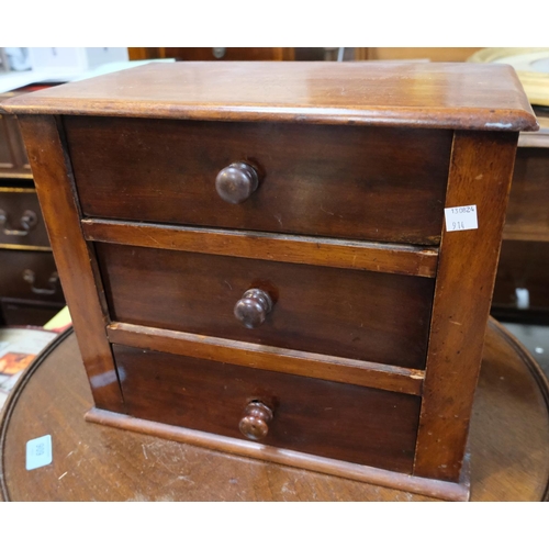 914 - A leather top mahogany drop end occasional table and a mahogany wall hanging cupboard and an apprent... 