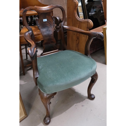 924 - A mahogany Georgian armchair with rams head armrests, cabriole legs and lyre shaped back, and a foot... 