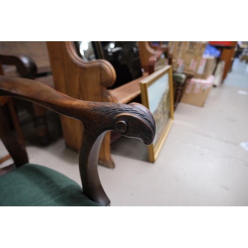 924 - A mahogany Georgian armchair with rams head armrests, cabriole legs and lyre shaped back, and a foot... 