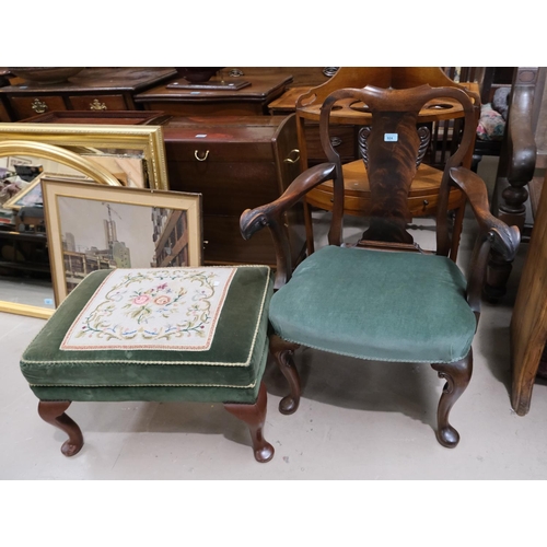 924 - A mahogany Georgian armchair with rams head armrests, cabriole legs and lyre shaped back, and a foot... 