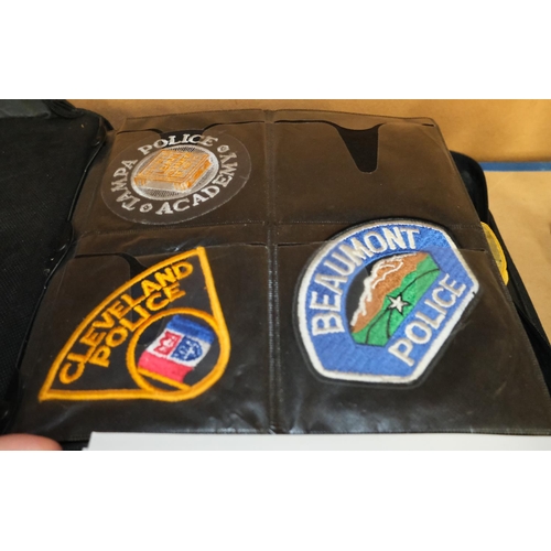 102 - US Police cloth badges, a collection of approx. 200 in album.