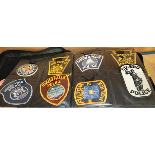 102 - US Police cloth badges, a collection of approx. 200 in album.