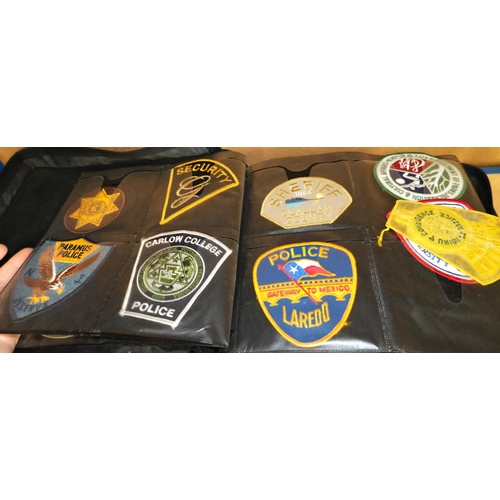 102 - US Police cloth badges, a collection of approx. 200 in album.